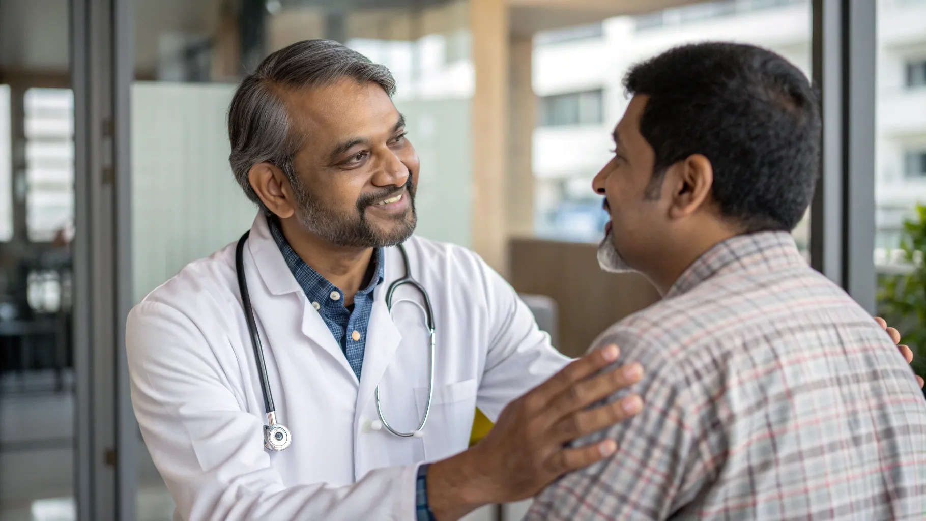 Cardiologist reassuring a patient about palpitations