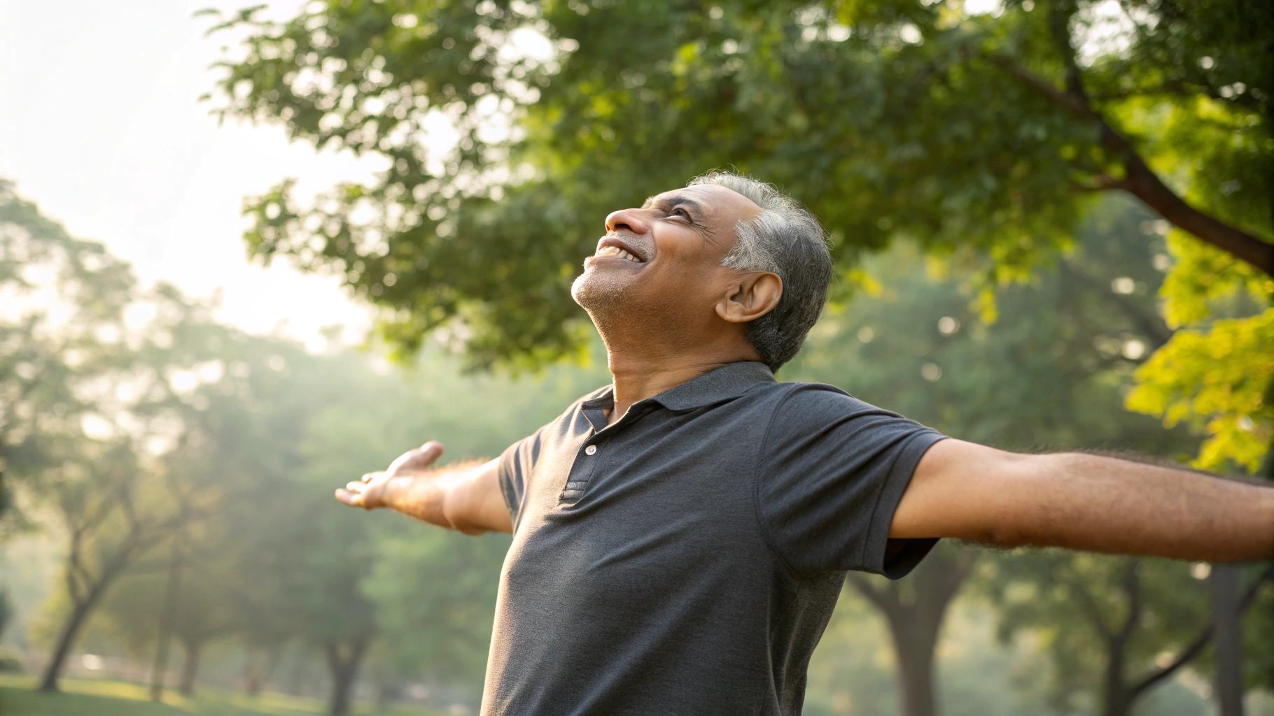 Man breathing freely outdoors after recovery