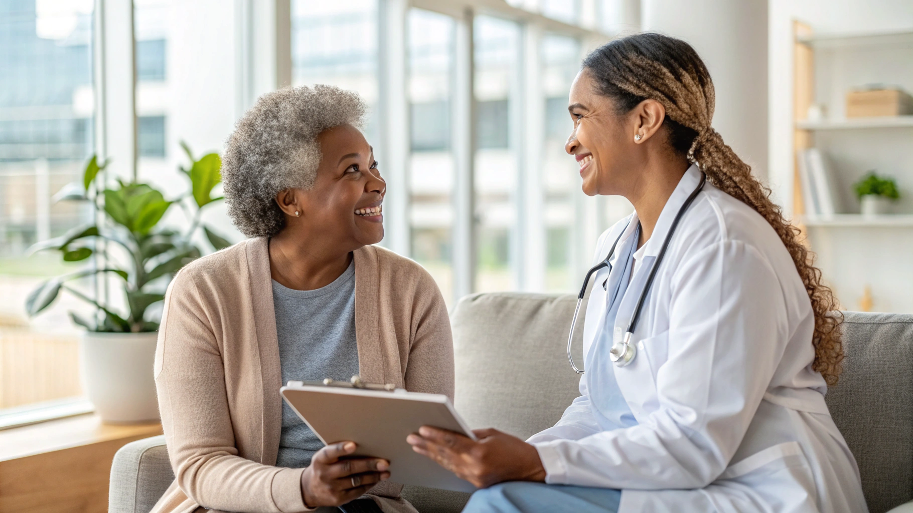 Doctor having supportive conversation with patient about heart health